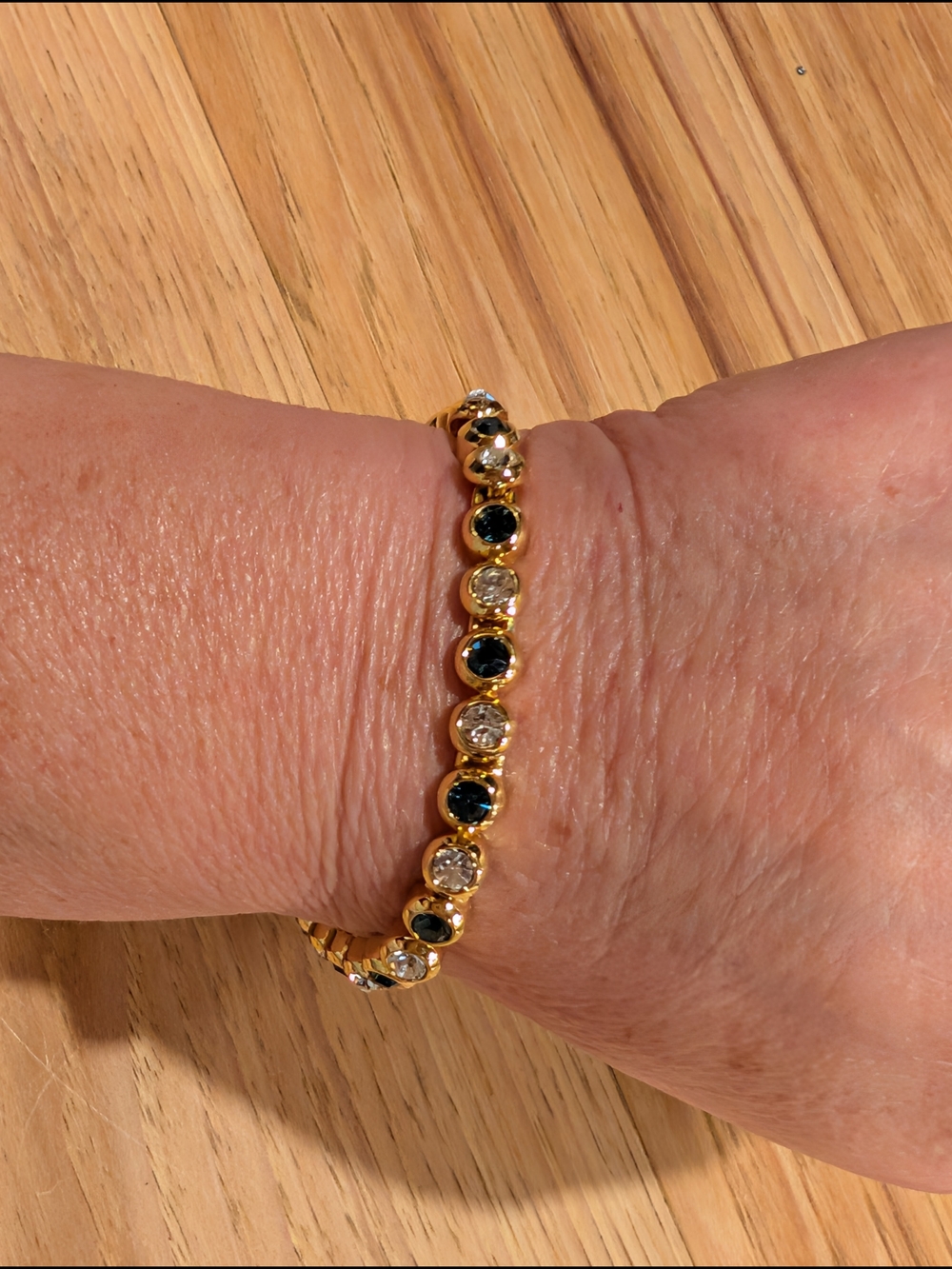 Gold-Tone Bracelet with Deep Blue and Clear Stones